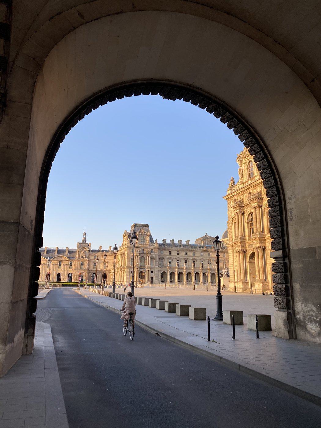 The Louvre seen through the Carrousel arch in Paris